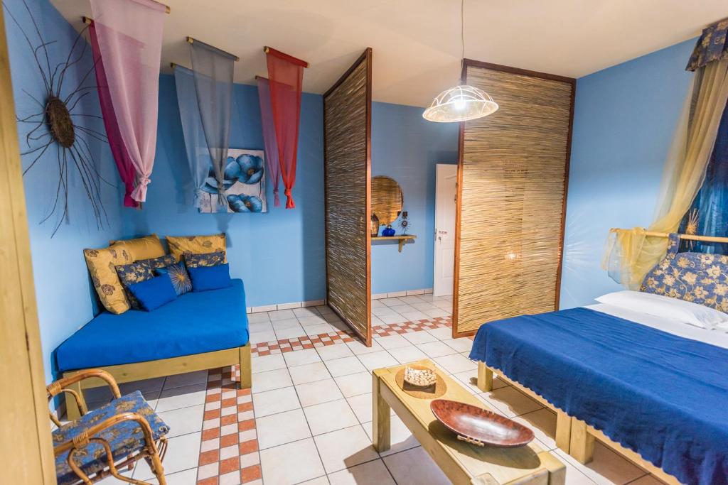 Postel nebo postele na pokoji v ubytování B&B Cinque Stelle Salento