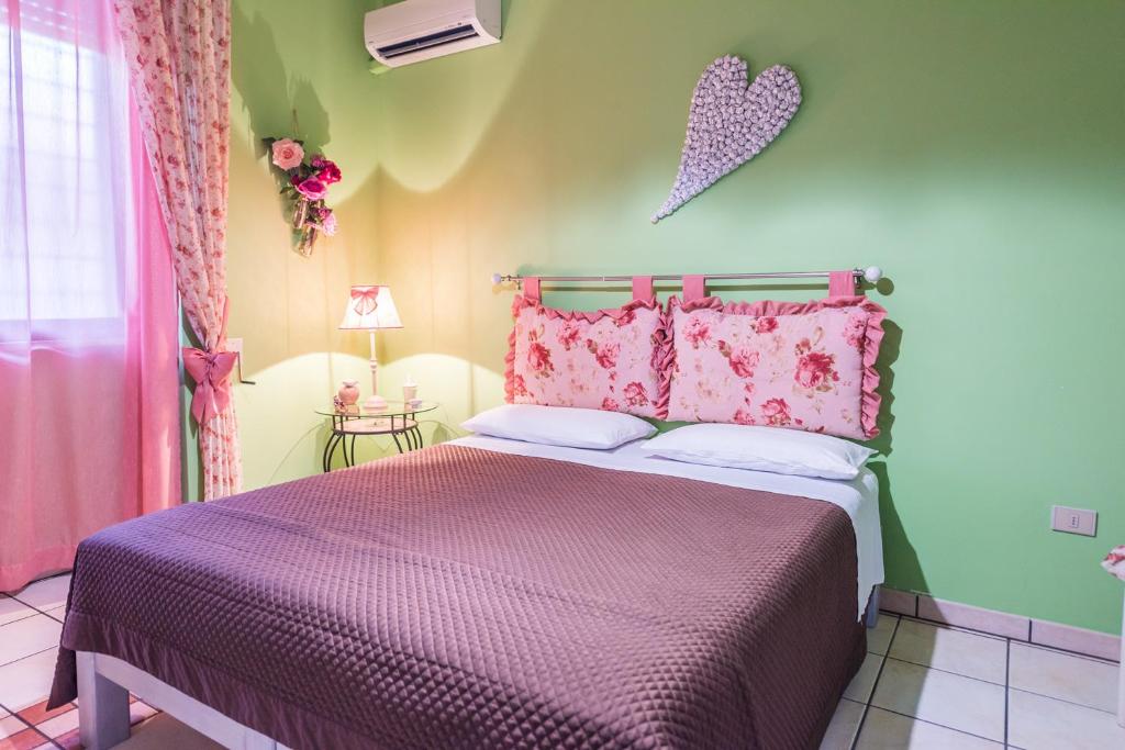 Postel nebo postele na pokoji v ubytování B&B Cinque Stelle Salento