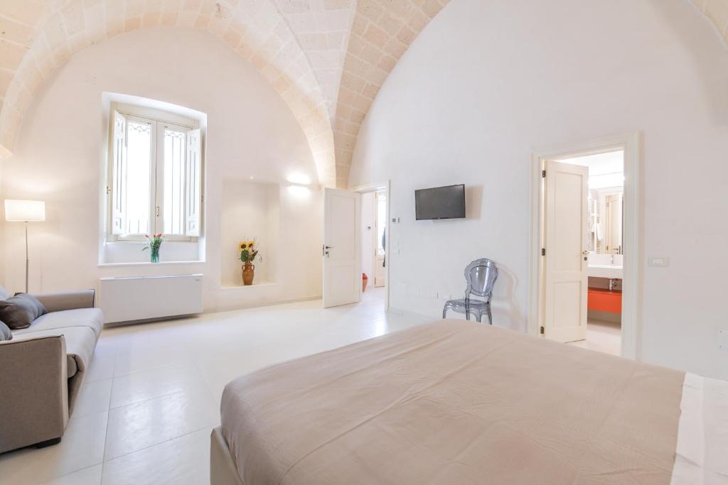 Postel nebo postele na pokoji v ubytování Casa Magadè B&B
