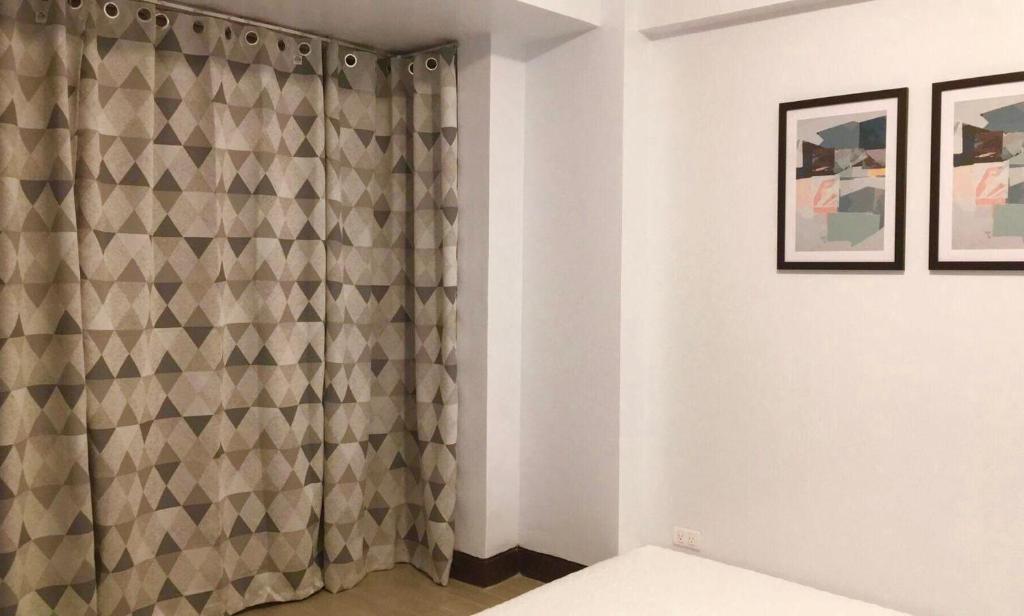 Postel nebo postele na pokoji v ubytování F-10C Parkside Villas