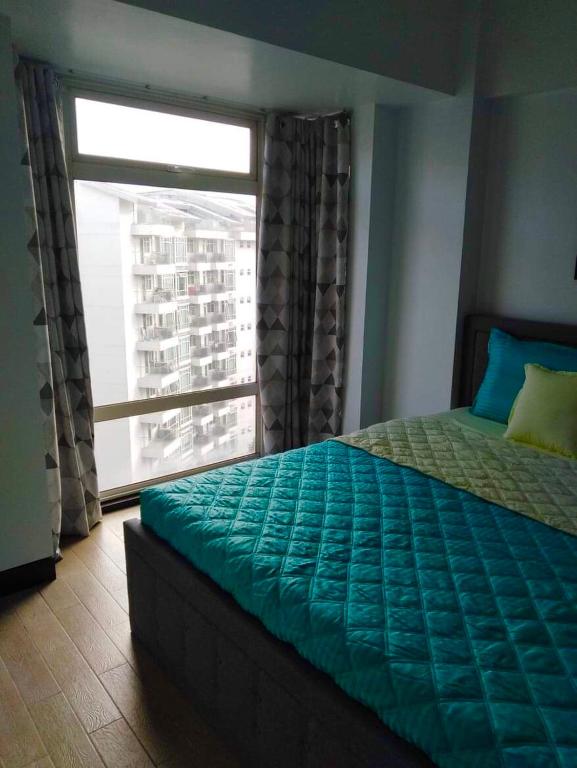 Postel nebo postele na pokoji v ubytování F-10C Parkside Villas