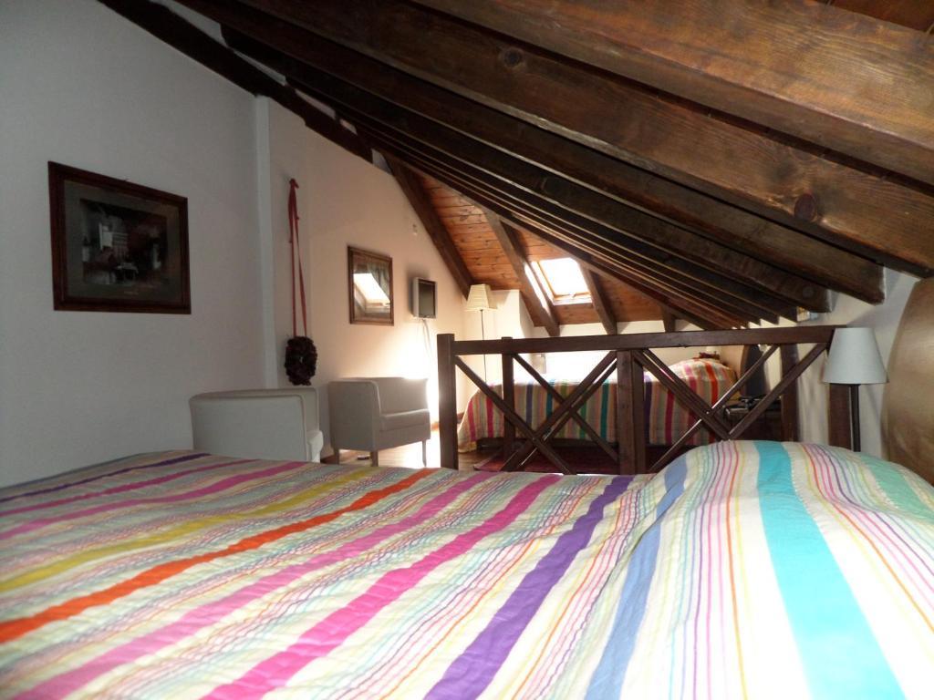 A bed or beds in a room at Arhontiko Aristis