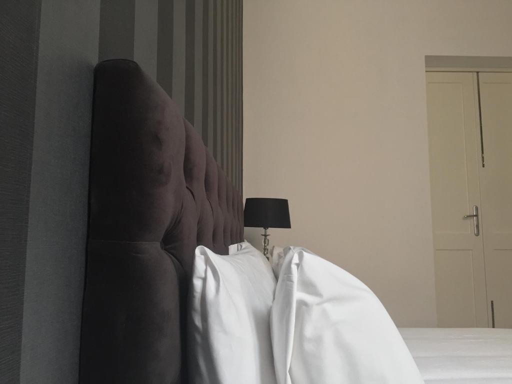 Postel nebo postele na pokoji v ubytování Dimora San Biagio Suites&Apartment
