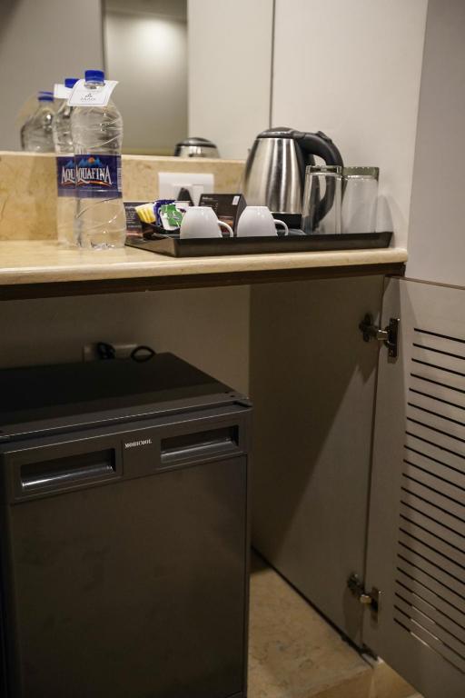Kuchyň nebo kuchyňský kout v ubytování Jaag Hotel