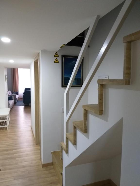 A television and/or entertainment centre at Tempo Life Apartman