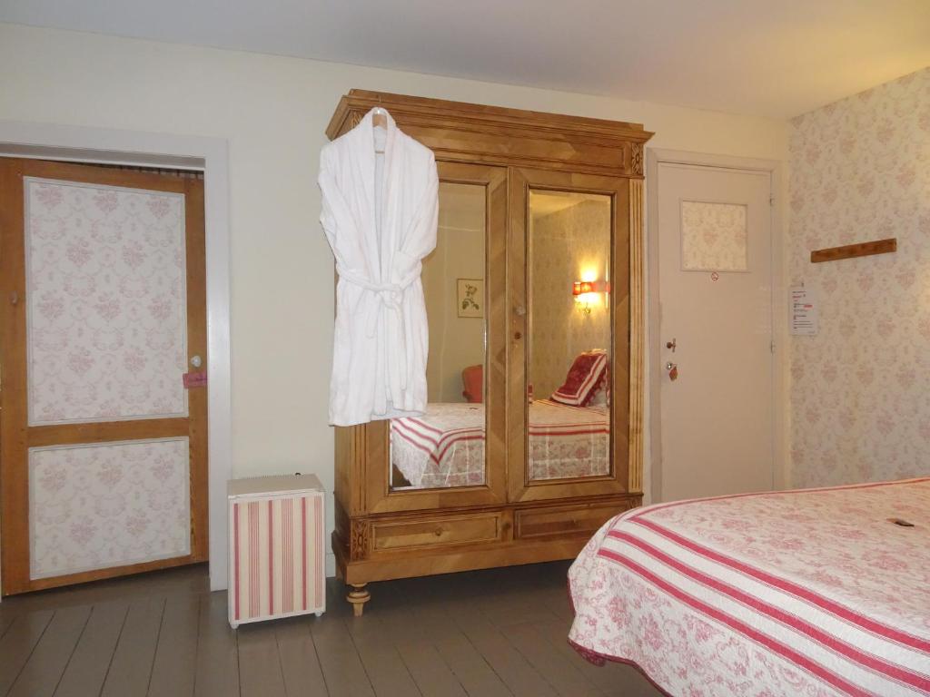 Postel nebo postele na pokoji v ubytování Guesthouse Alizée