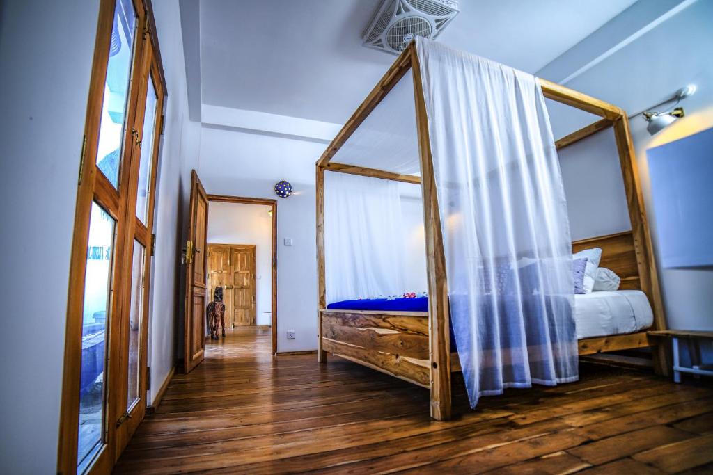 Postel nebo postele na pokoji v ubytování Amanta Beach