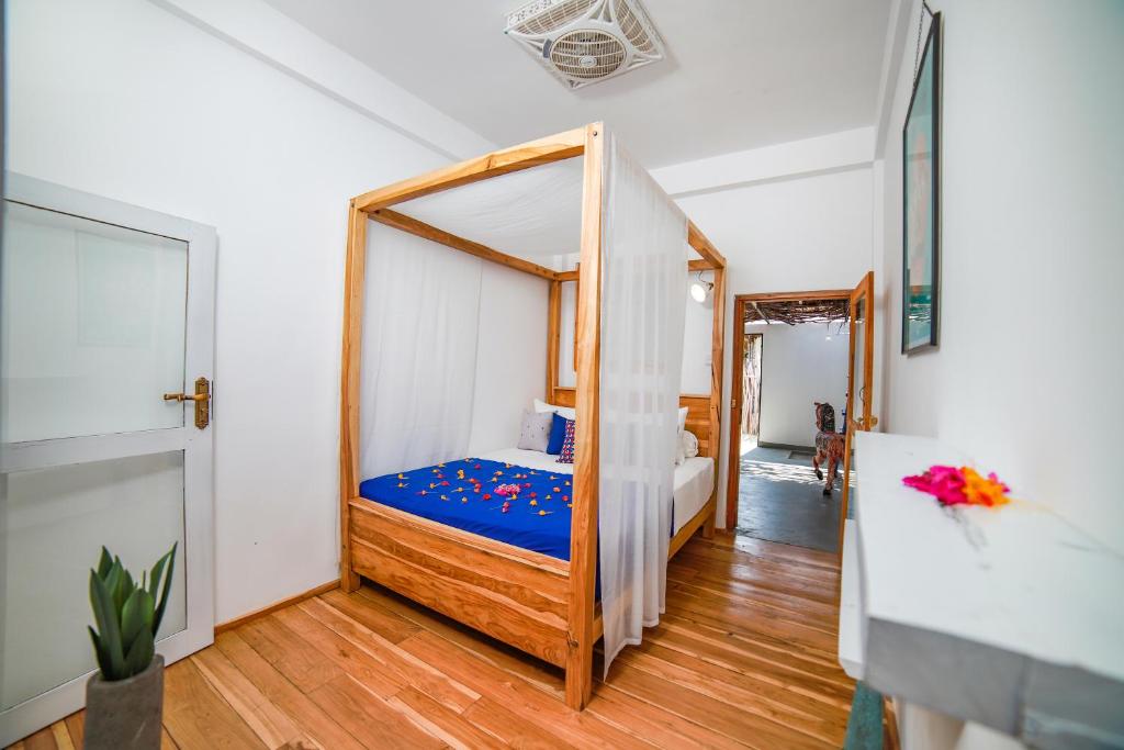 Postel nebo postele na pokoji v ubytování Amanta Beach