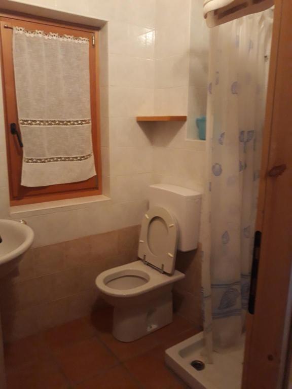 Koupelna v ubytování Agriturismo I Conti Di Piscè