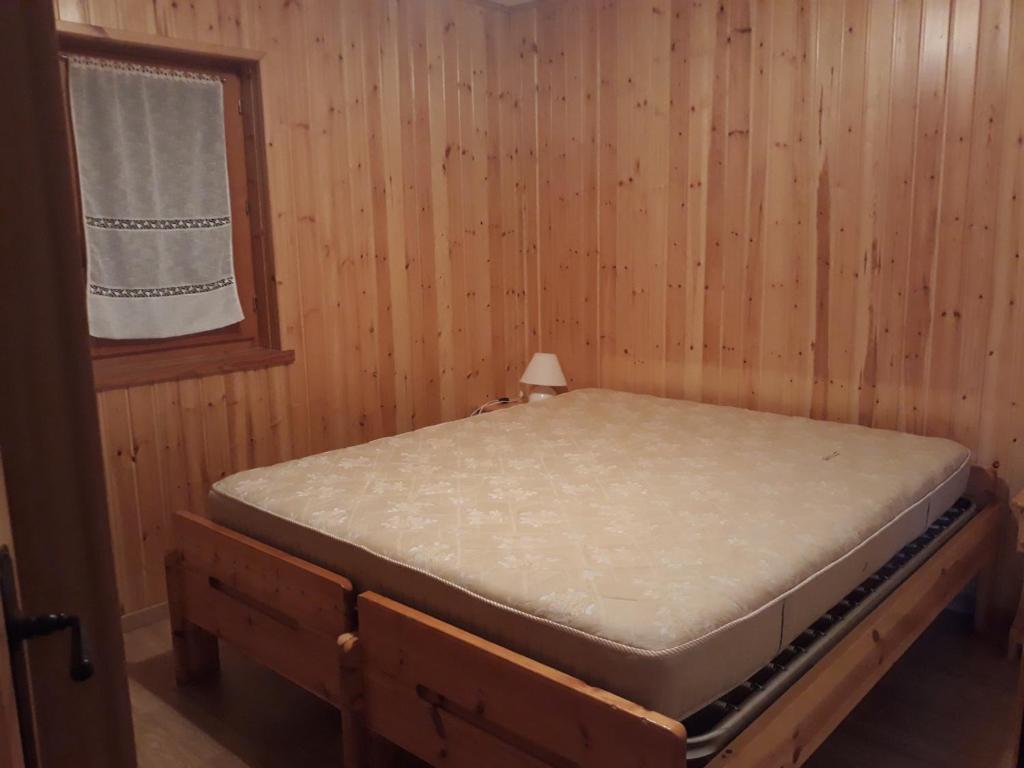Postel nebo postele na pokoji v ubytování Agriturismo I Conti Di Piscè