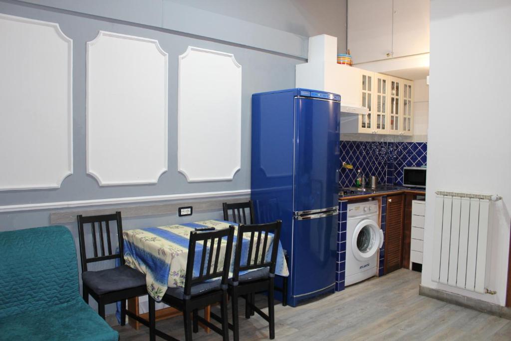 A kitchen or kitchenette at Gmax Guelfa Apartments