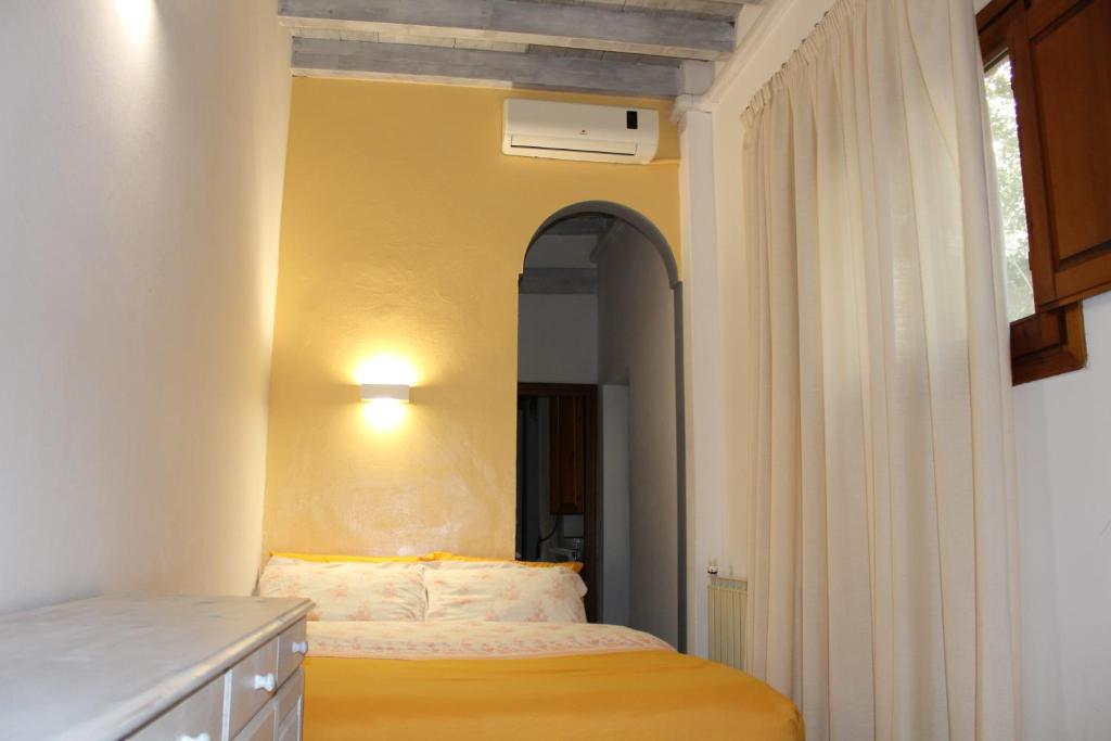 A bed or beds in a room at Gmax Guelfa Apartments
