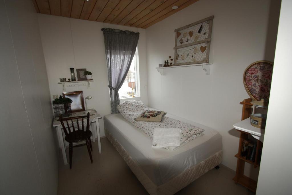 Postel nebo postele na pokoji v ubytování Dalvík Hostel Gimli