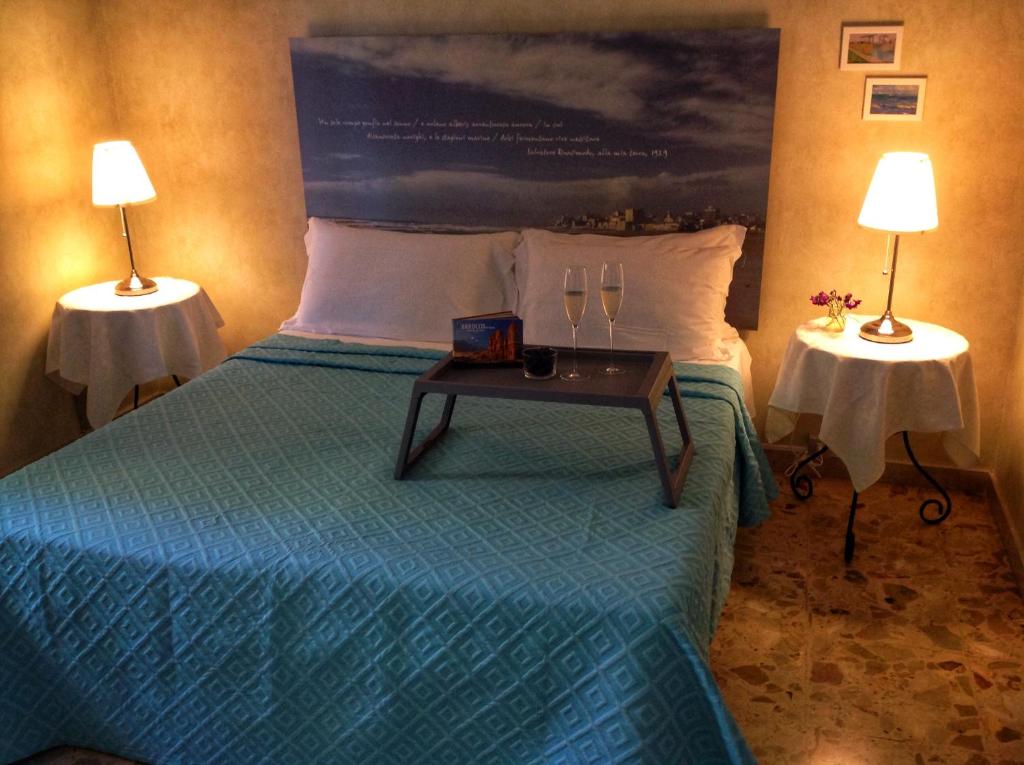 Postel nebo postele na pokoji v ubytování Mare Nostrum Petit Hôtel