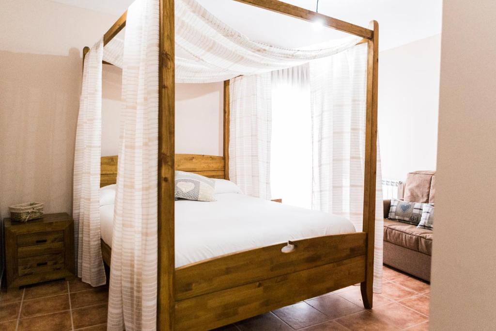 Postel nebo postele na pokoji v ubytování Casa Rural Tio Mora