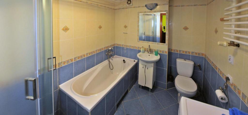 Kúpeľňa v ubytovaní Apartament przy Walowej