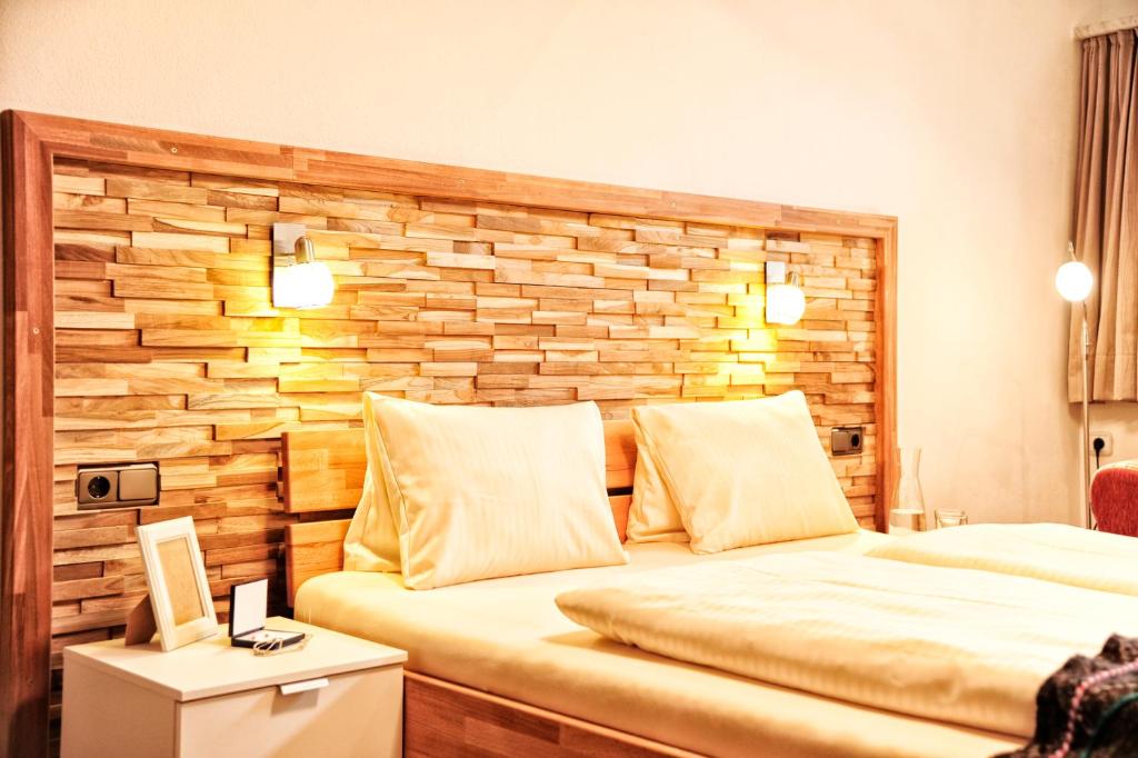 Postel nebo postele na pokoji v ubytování Appartements & Chalets Wiesenruh