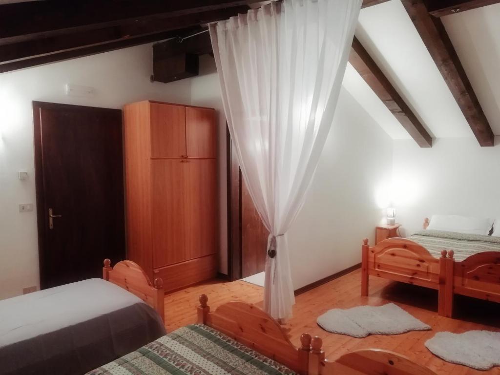 Postel nebo postele na pokoji v ubytování Elison-on the lake B&B
