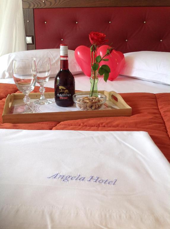 Nápoje v ubytování Angela Hotel