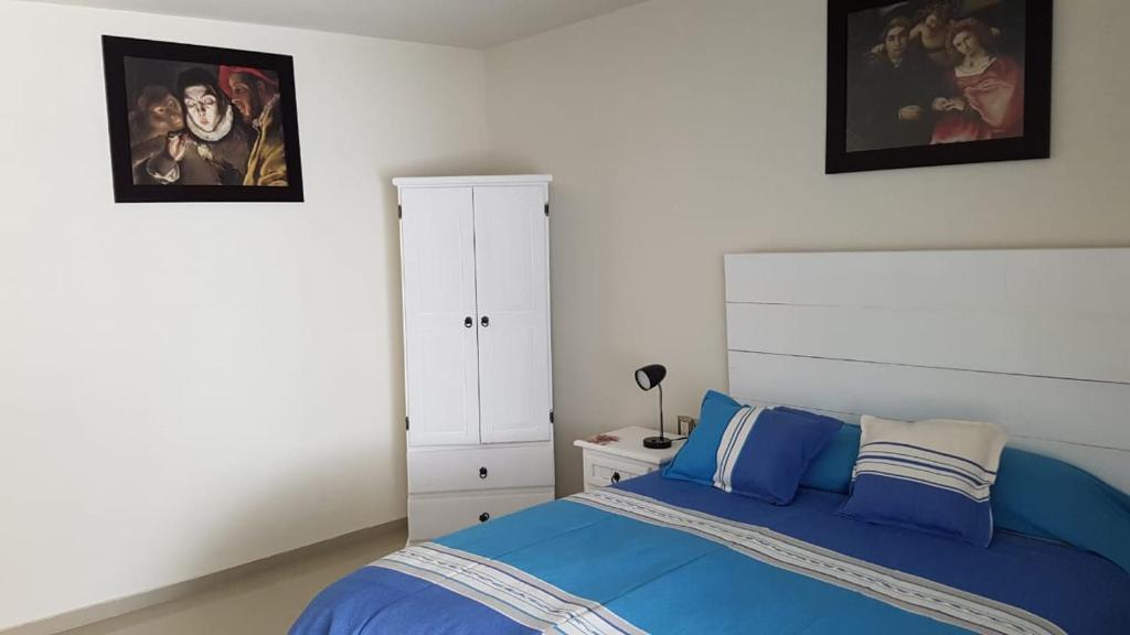 Postel nebo postele na pokoji v ubytování Casa Ana Celia