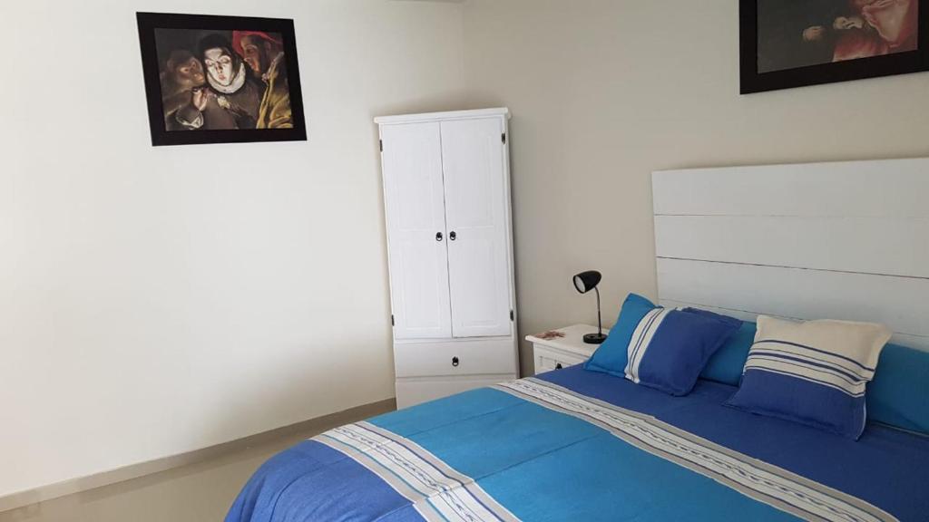 Postel nebo postele na pokoji v ubytování Casa Ana Celia