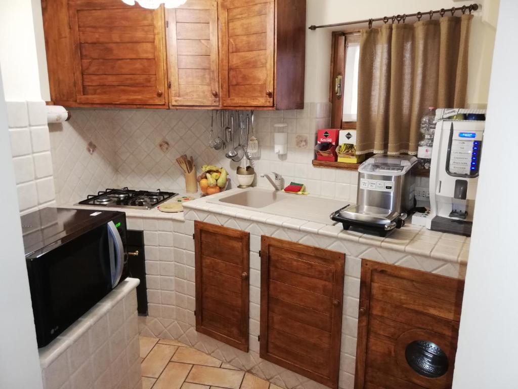 Kuchyňa alebo kuchynka v ubytovaní Casa Maria