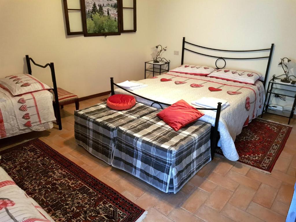 Posteľ alebo postele v izbe v ubytovaní Casa Maria