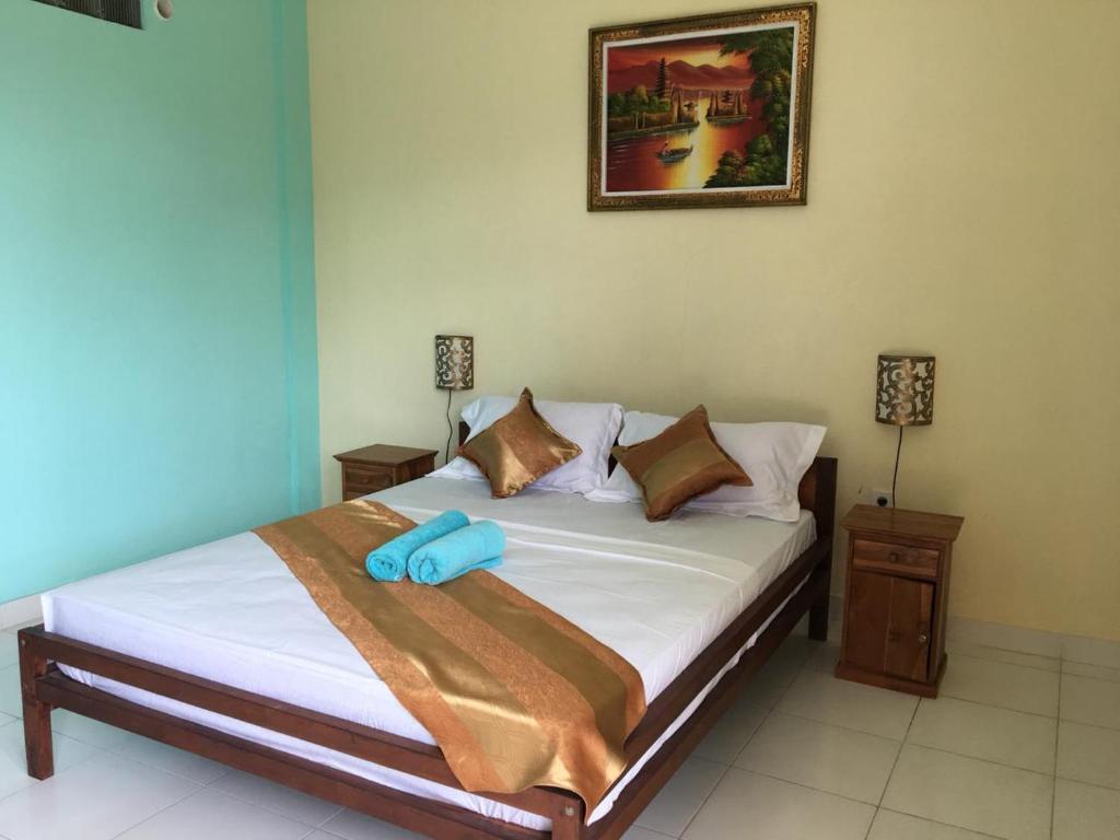 Postel nebo postele na pokoji v ubytování Repag Wayan Canggu Hostel
