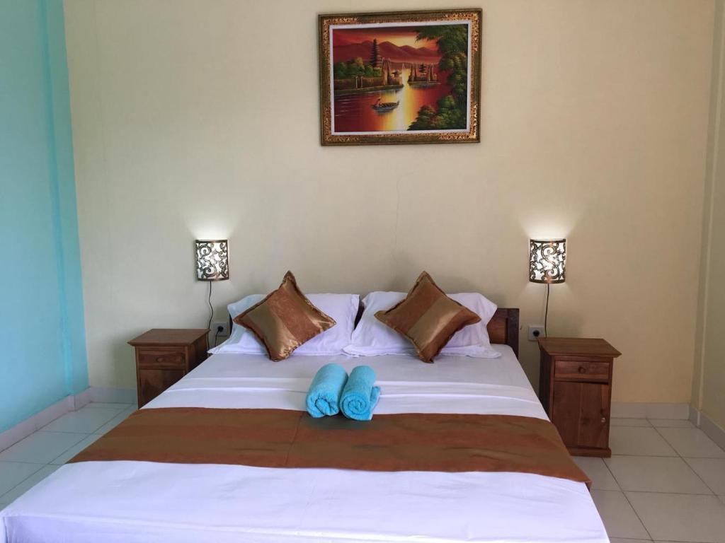 Postel nebo postele na pokoji v ubytování Repag Wayan Canggu Hostel