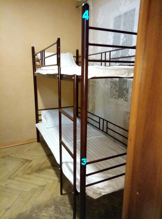 Postel nebo postele na pokoji v ubytování Hostel "От рассвета до заката"