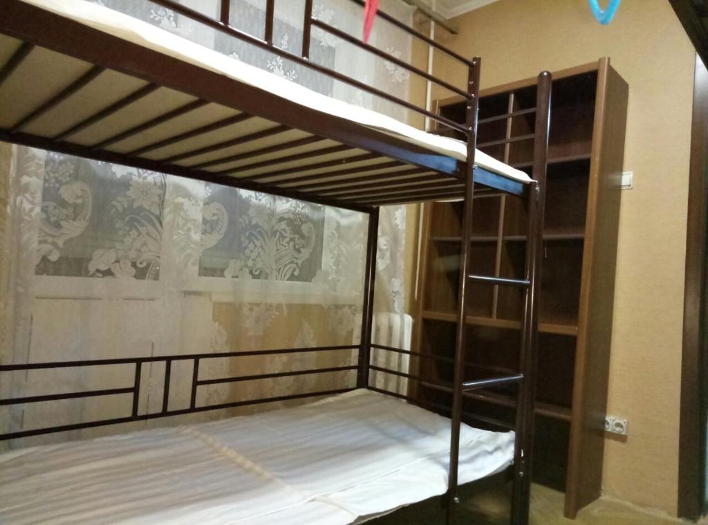 Postel nebo postele na pokoji v ubytování Hostel "От рассвета до заката"