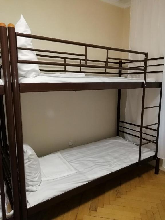 Postel nebo postele na pokoji v ubytování Hostel "От рассвета до заката"
