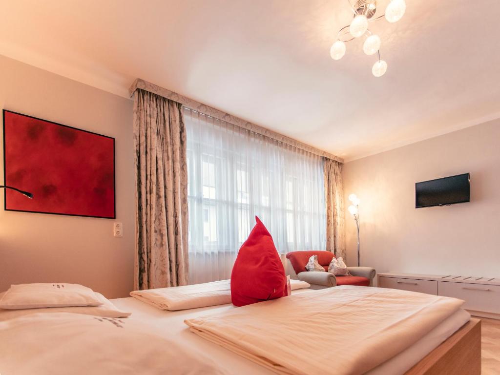 Postel nebo postele na pokoji v ubytování Hotel Rosenvilla