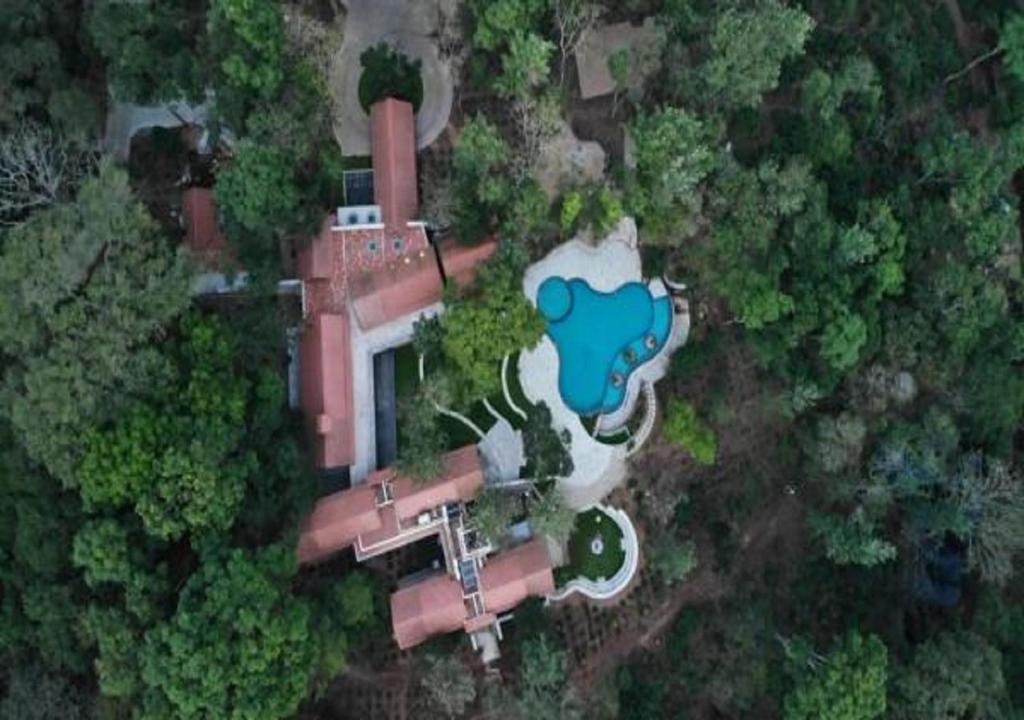 Bazén v ubytování The Birchwood Retreat, Madikeri nebo v jeho okolí