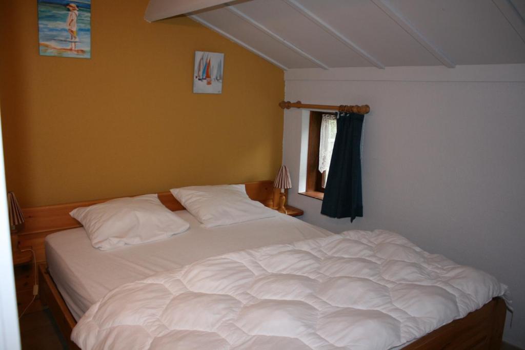 Postel nebo postele na pokoji v ubytování Vakantienestje