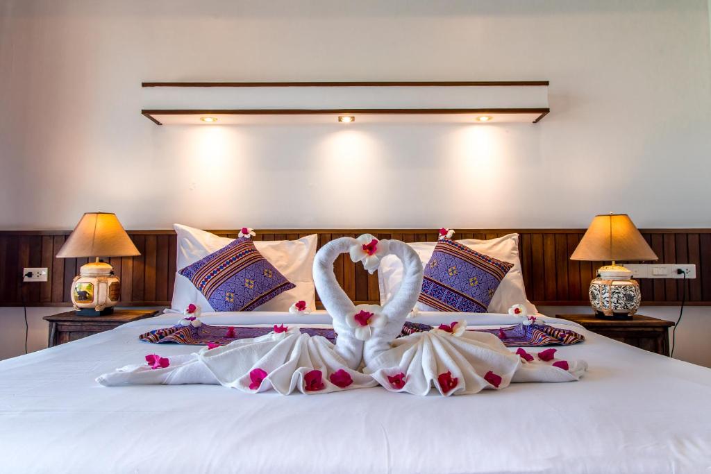 Postel nebo postele na pokoji v ubytování Zama Resort Koh Phangan