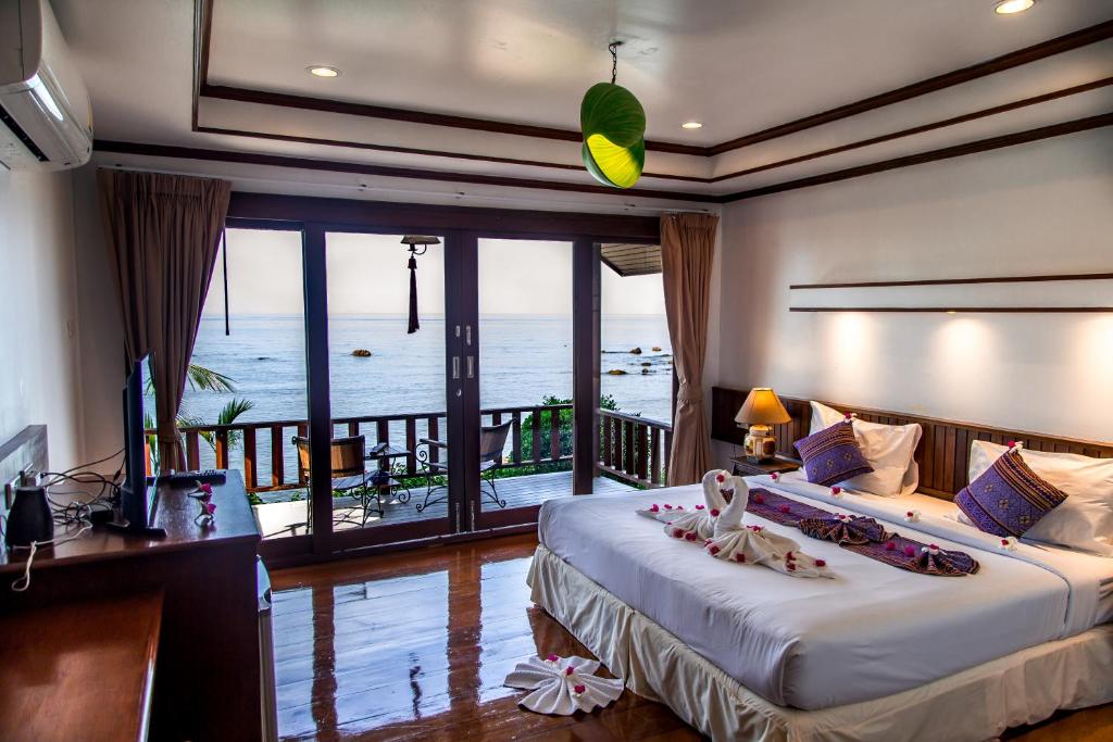 Postel nebo postele na pokoji v ubytování Zama Resort Koh Phangan