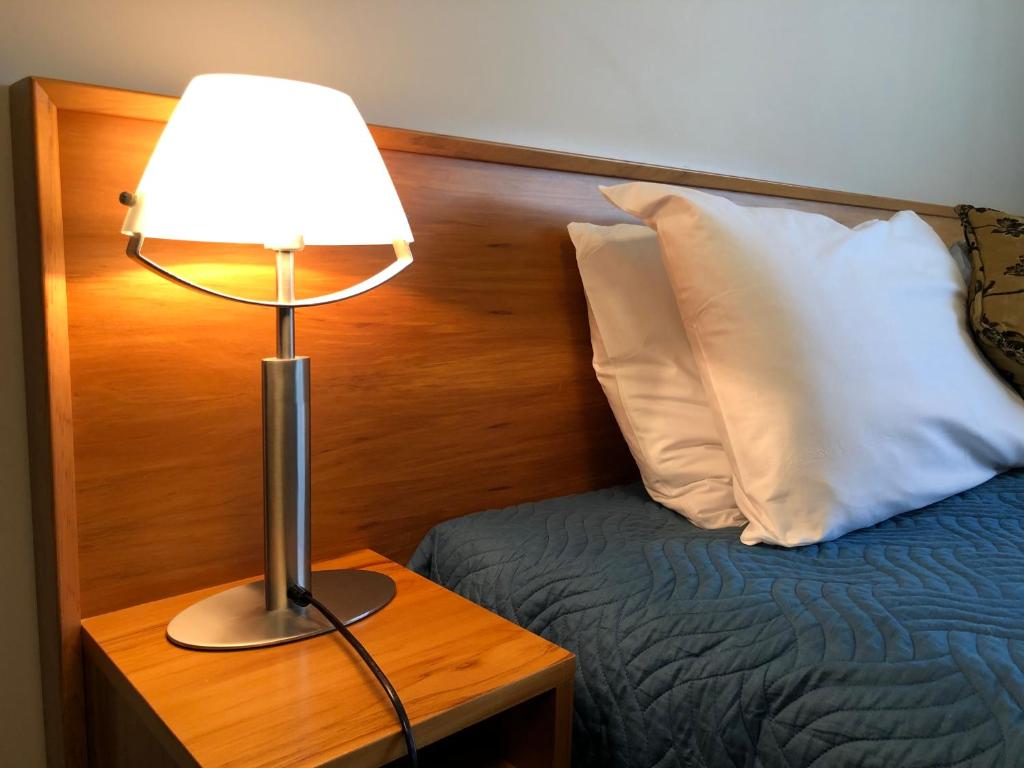 Postel nebo postele na pokoji v ubytování High Peaks Hotel