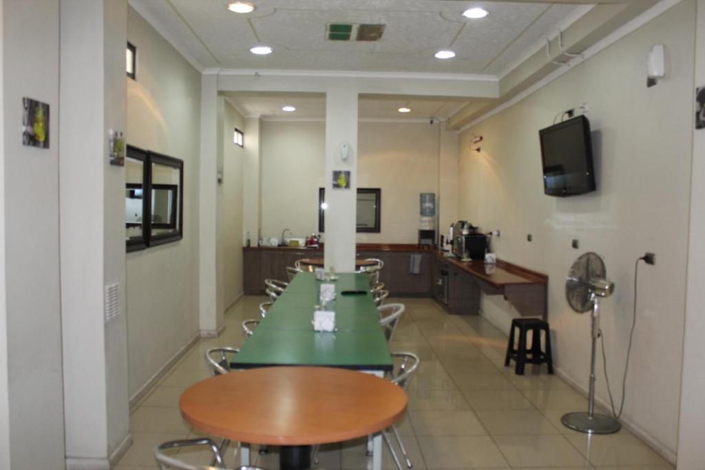 TV a/nebo společenská místnost v ubytování Hostal Quinta Normal