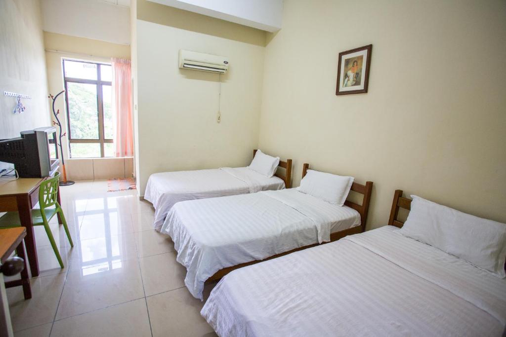 Postel nebo postele na pokoji v ubytování Hotel Comfort Inn