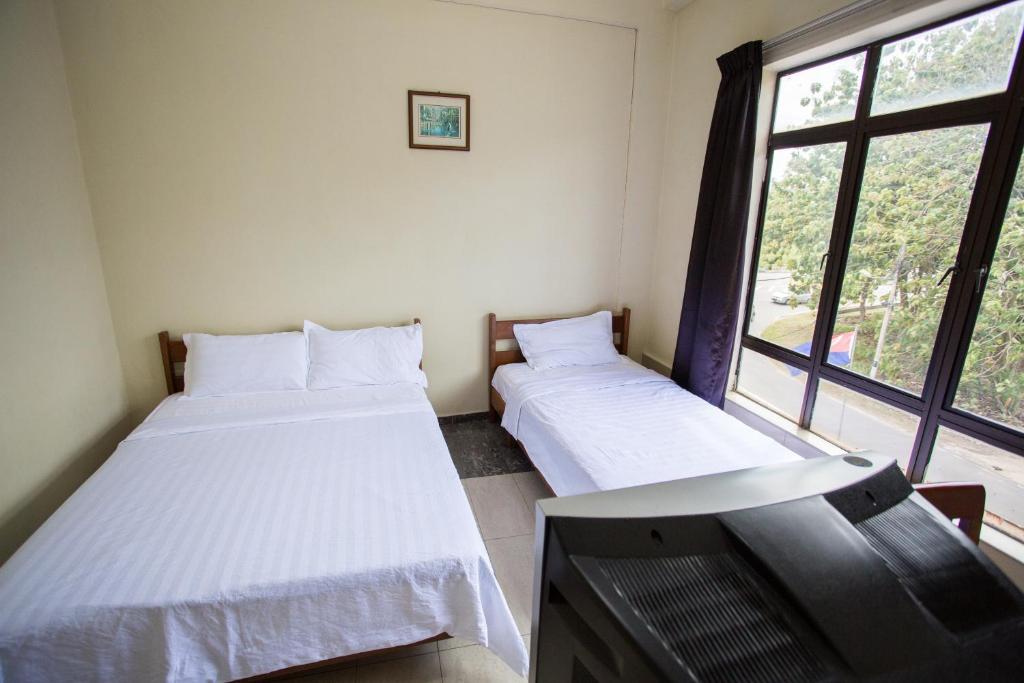 Postel nebo postele na pokoji v ubytování Hotel Comfort Inn