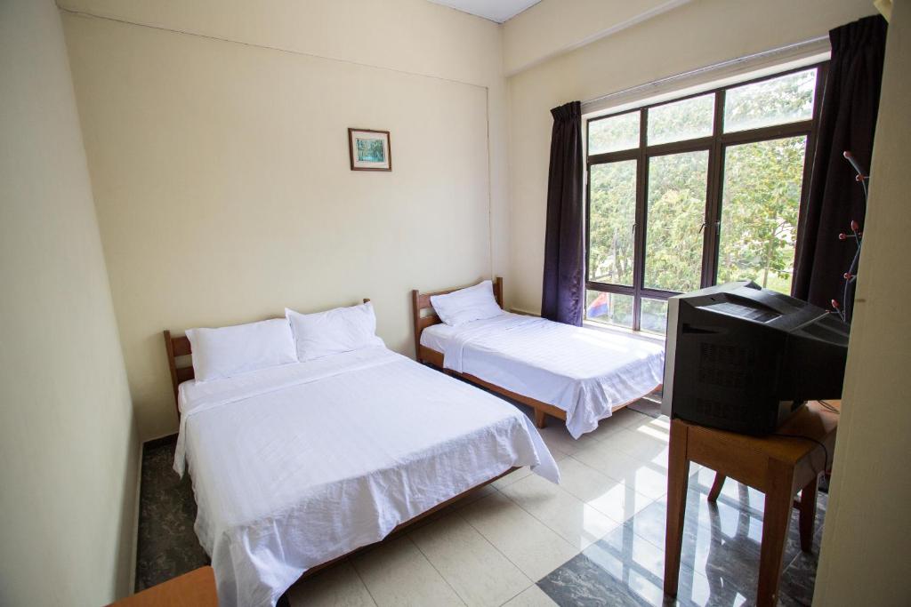 Postel nebo postele na pokoji v ubytování Hotel Comfort Inn