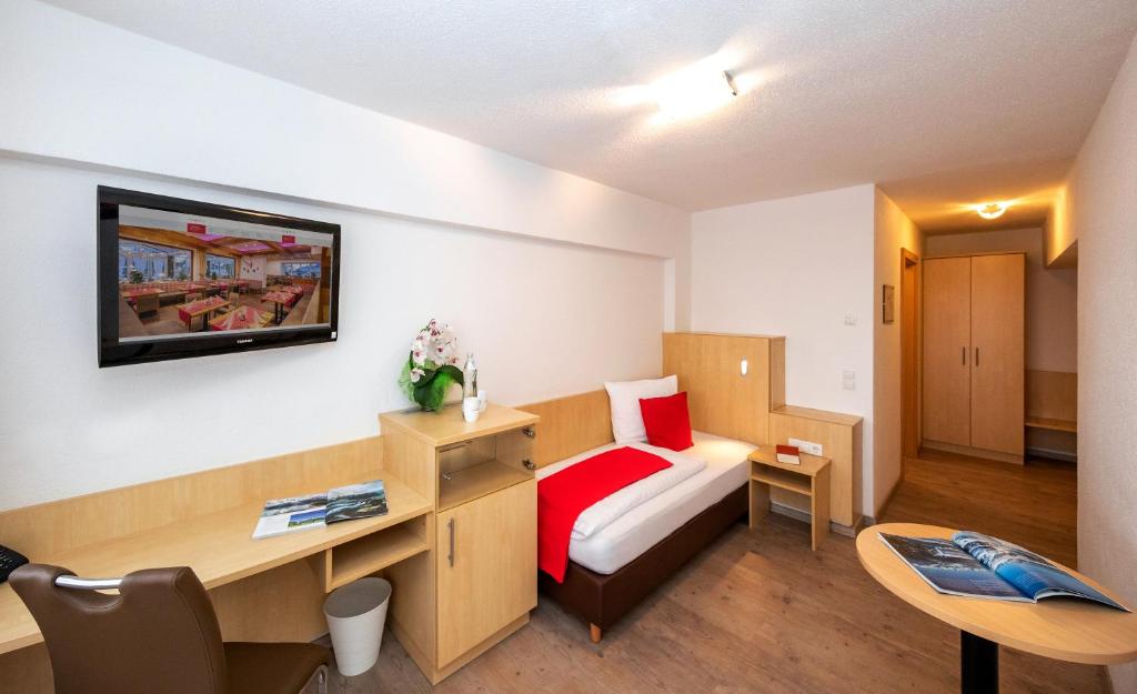 Postel nebo postele na pokoji v ubytování Hotel-Restaurant Lampenhäusl