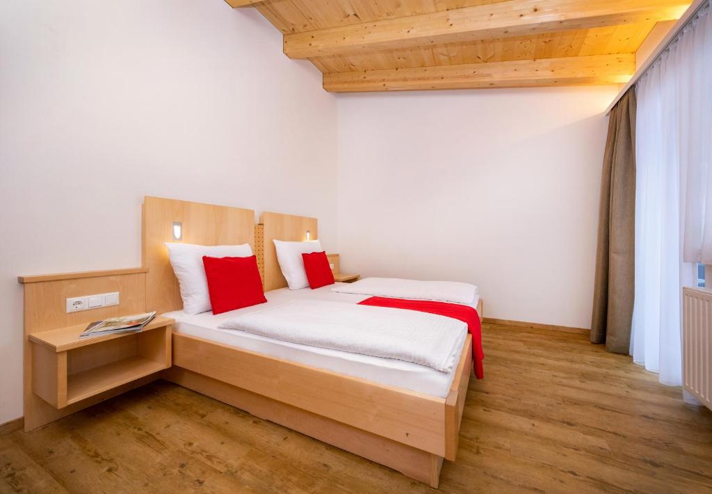 Postel nebo postele na pokoji v ubytování Hotel-Restaurant Lampenhäusl