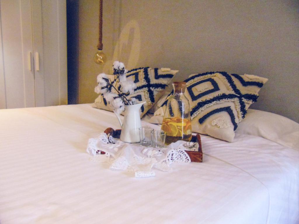 A bed or beds in a room at Balneario Aguas de Villaharta