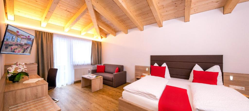 Postel nebo postele na pokoji v ubytování Hotel-Restaurant Lampenhäusl