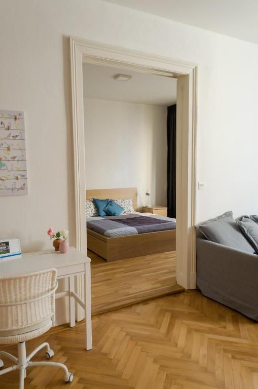 Postel nebo postele na pokoji v ubytování Oltec Apartment Brno