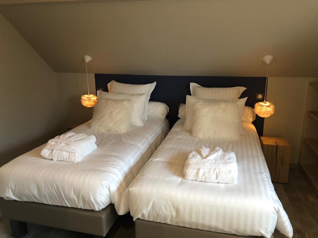 Postel nebo postele na pokoji v ubytování Gîte Wellness Le Six H