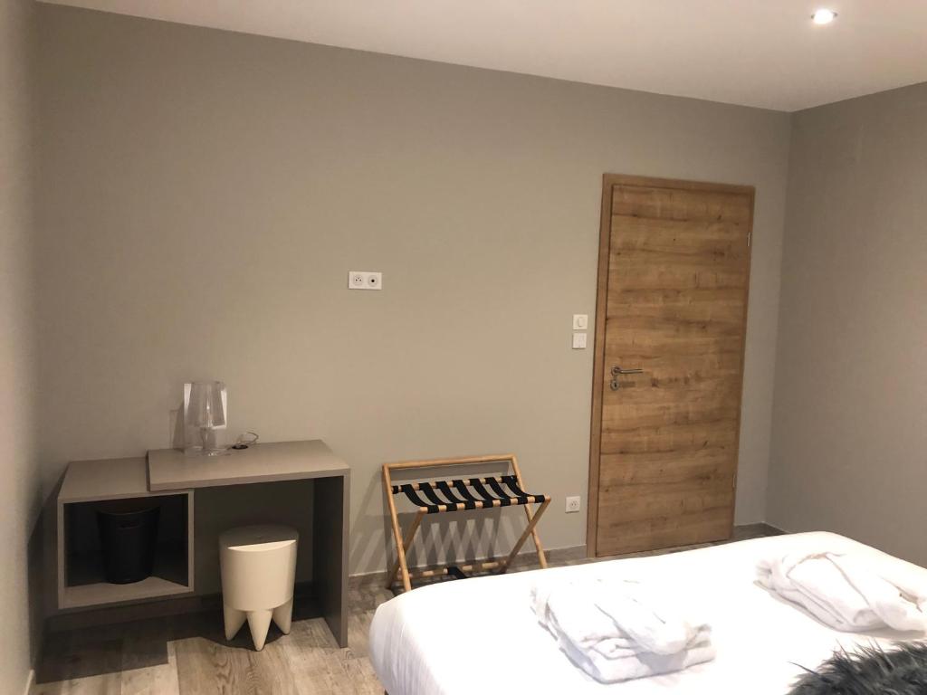 Postel nebo postele na pokoji v ubytování Gîte Wellness Le Six H