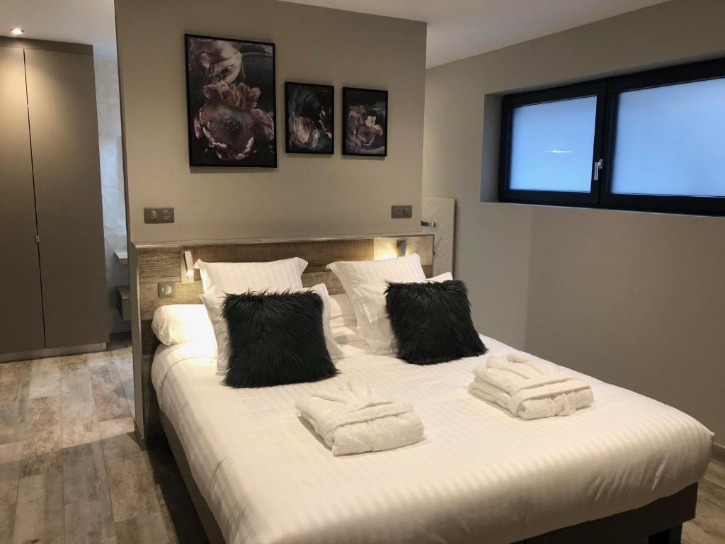 Postel nebo postele na pokoji v ubytování Gîte Wellness Le Six H